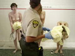 Strip search scene in women prison