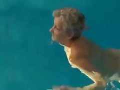 Granny in the pool with dildo inflatable