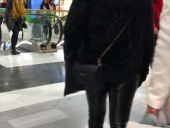 Shopping in tight shiny leather pants