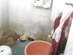 Indian housewife free from her daily household work taking shower on weekend unaware that her man fixed a hidden cam to record her hot shower. video2porn2