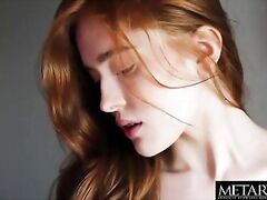 A horny natural redhead masturbating naked on her bed