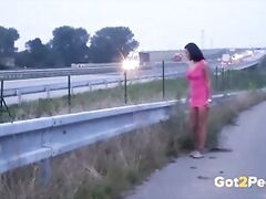 Naughty girls outside showing off their bodies and peeing