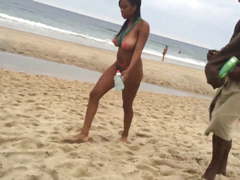 Beautiful black girl at the nude beach